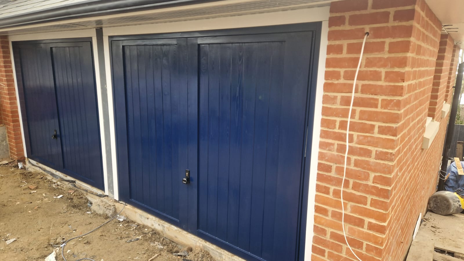 Essex Prestige Doors | Expert supply, installation, repairs, and servicing of roller garage doors, up-and-over doors, sectional garage doors, side hinge doors, and bespoke front entrance doors. Emergency 24-hour call-outs and tailored services available